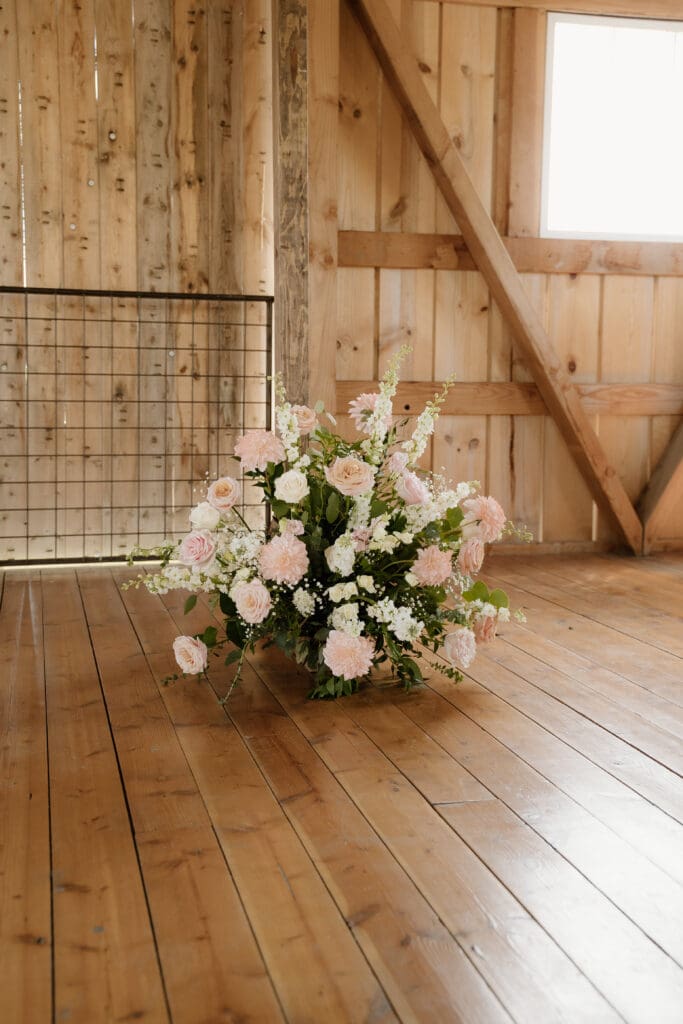 Large side arrangement with Blush and white flowers